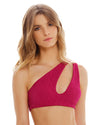 blonde woman wearing Fucsia One Shoulder Bra Top features a beautiful cut out detail, adjustable strap for support and removable cups for shape.