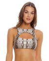 woman wearing a Cut Out Bra Top that Features Over the Shoulder straps for comfort and an adjustable tie back