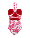  white and fucsia Bandeau One Piece that features a bandeau top with cutout. Hand beading accentuates the print.
