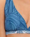 woman wearing a blue Branded triangle Top features a classic triangle top design with a slim base that helps shape and support